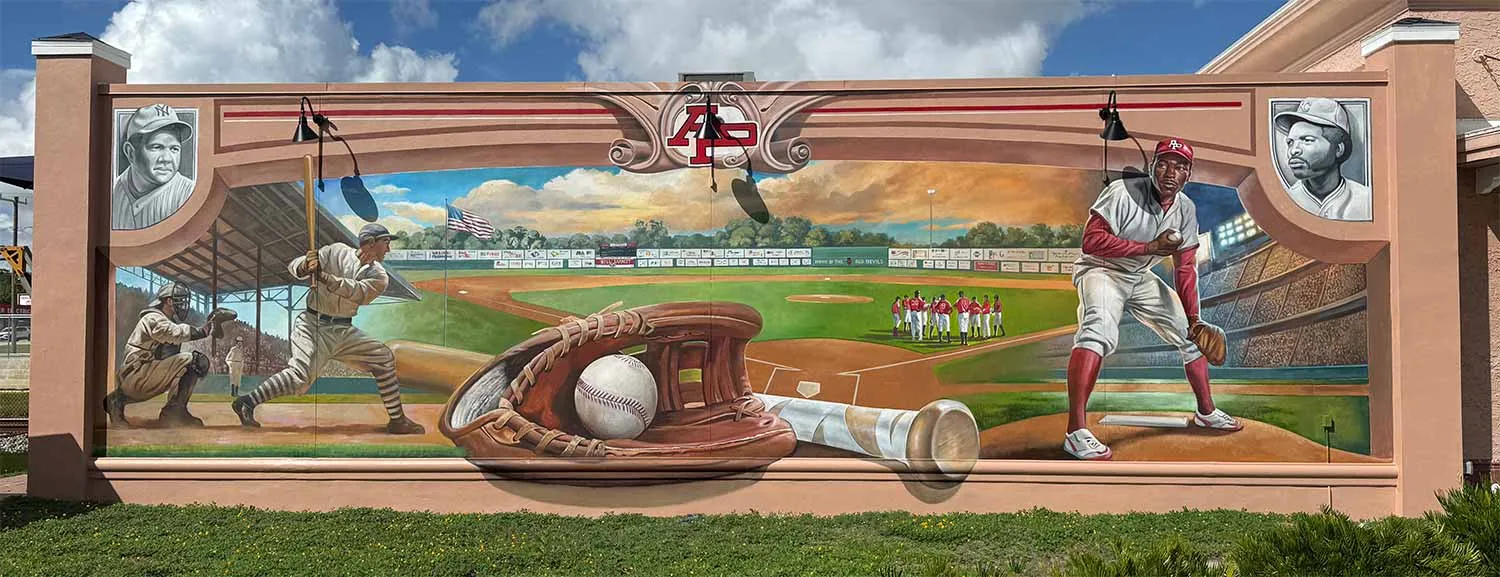 Vintage baseball uniforms and equipment on display