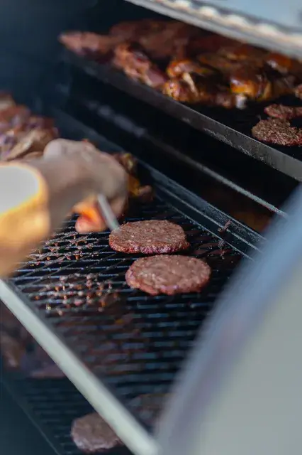 Burgers on a grill.