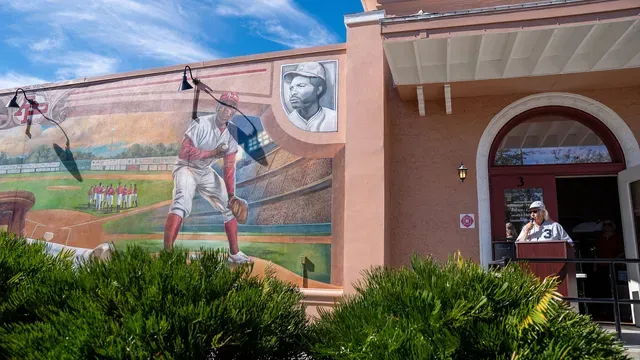 The exterior mural on the Depot addition with a portrait medallion of Hal McRae.