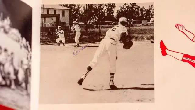 A yearbook page with a photograph of a pitcher in mid-delivery.