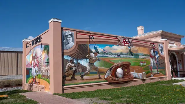 The mural and the Depot Museum in sunshine with nobody about.
